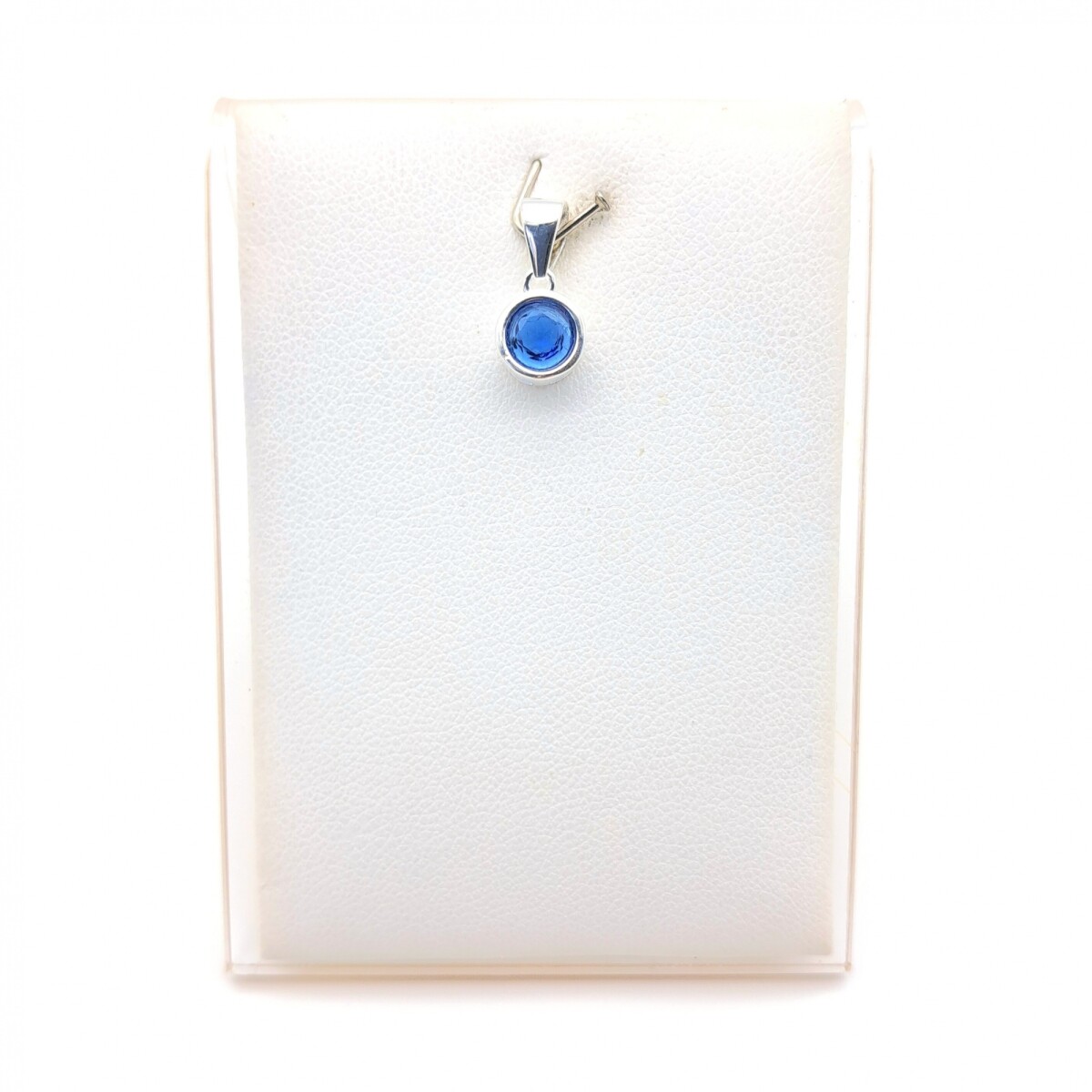 Dije de plata 925 con circonia azul, PUNTO DE LUZ. 