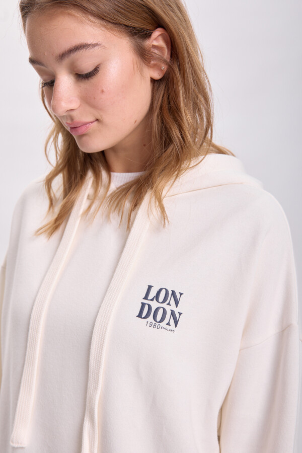 Canguro deportivo oversize Crudo