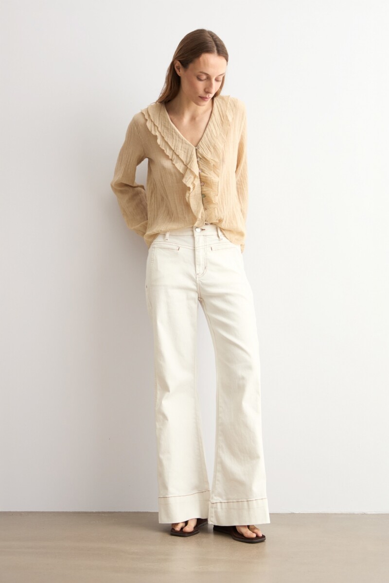 Blusa con volados beige