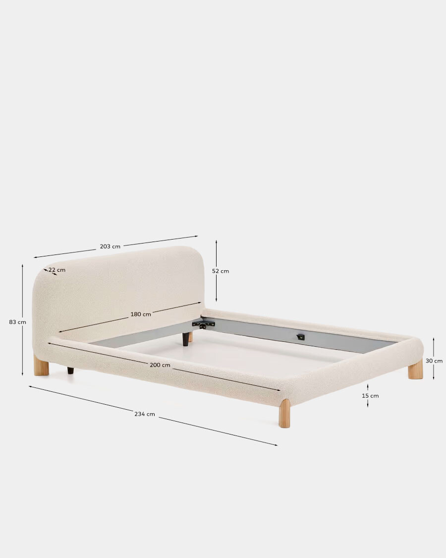 Cama desenfundable Odina bouclé crudo y patas de madera maciza de fresno acabado tono natural para colchón de 180 x 200 cm.