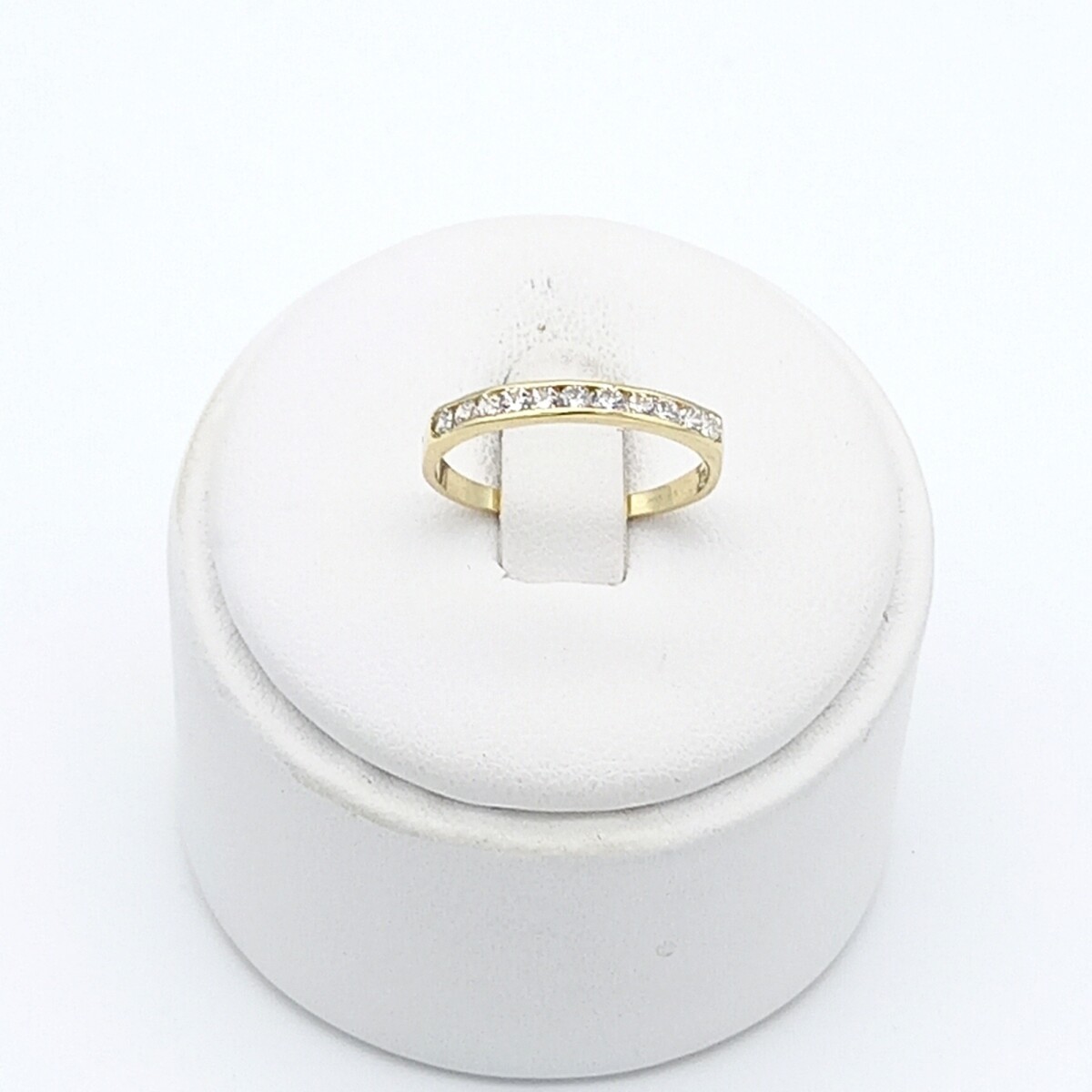 Anillo de oro 10 ktes con circonias, MEDIO SIN FIN. 