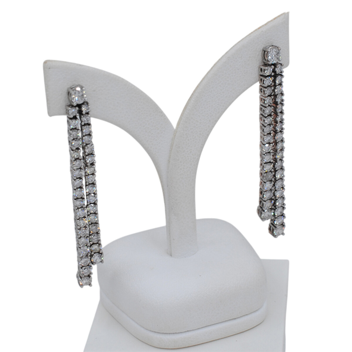 Caravanas largas en oro 18k blanco 
