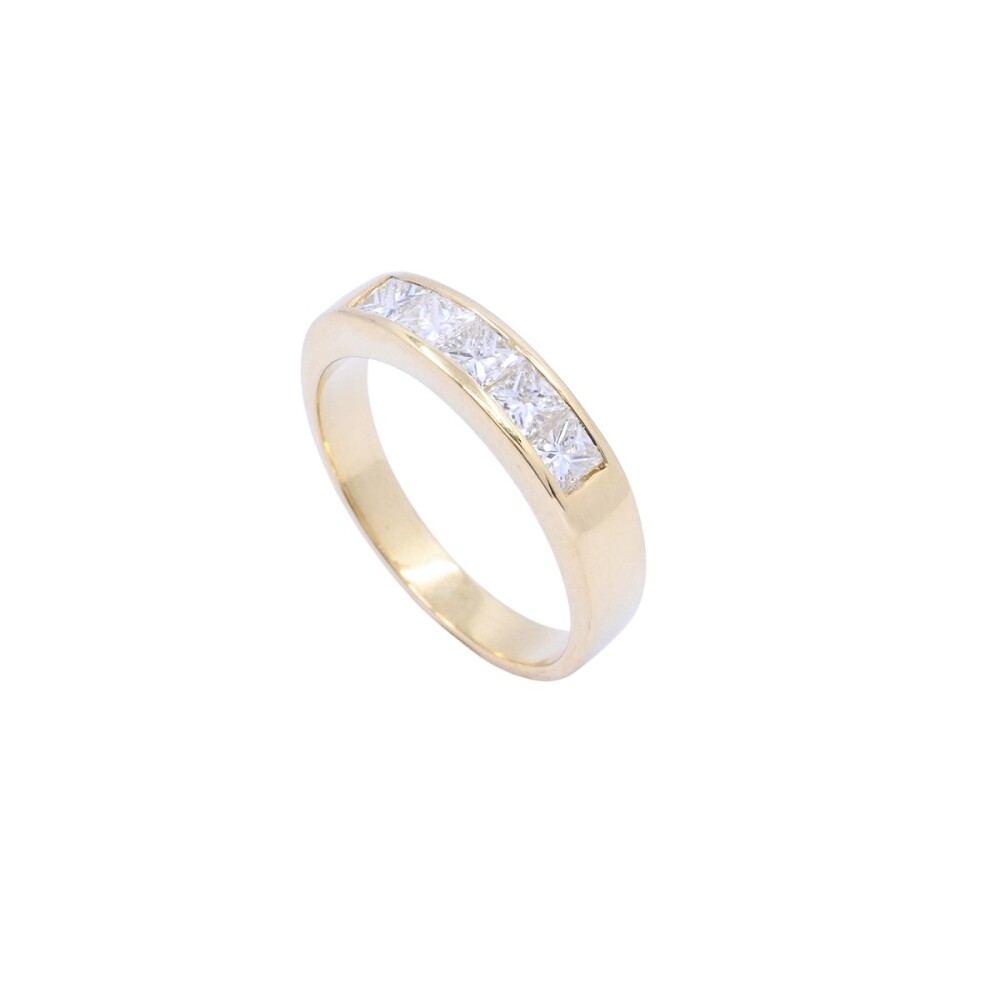 Anillo medio sin fin oro 18k amarillo carril con 5 brillantes princesa. Anillo medio sin fin oro 18k amarillo carril con 5 brillantes princesa.