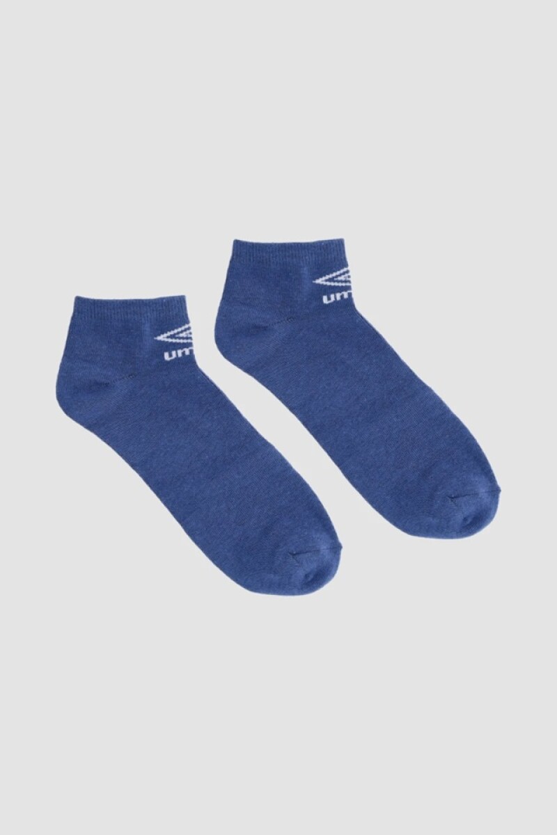 Media corta Lisa Individual Umbro Hombre - 001 