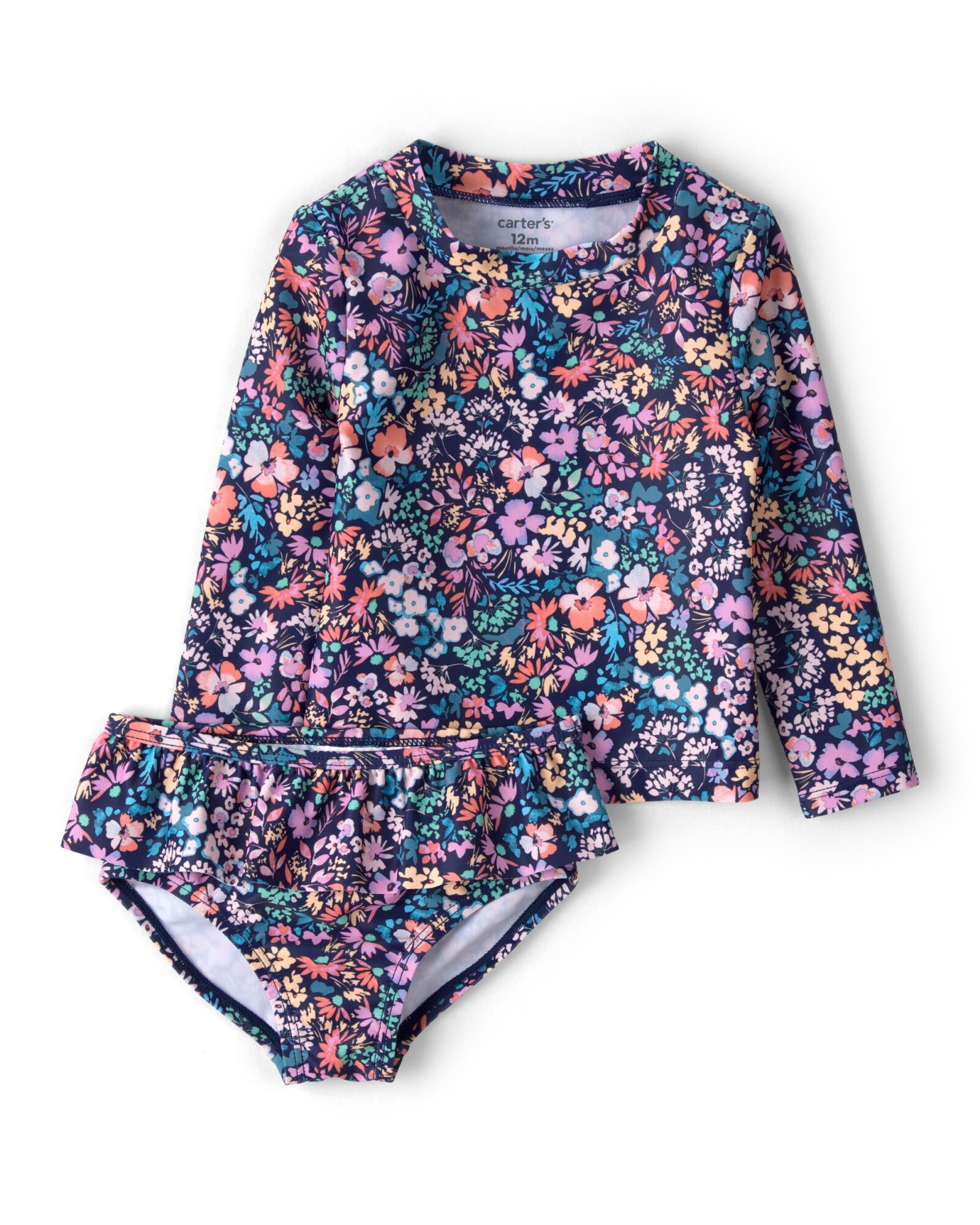 Malla de baño dos piezas, manga larga, con protección UPF 50+, diseño floral. Talles 3-24M Sin color