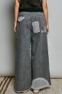 PANTALON CON PARCHE Negro