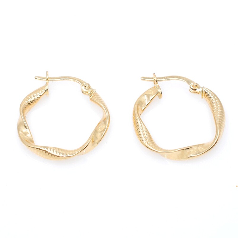 Aros torneados en oro 18k. Diametro 18mm Aros torneados en oro 18k. Diametro 18mm