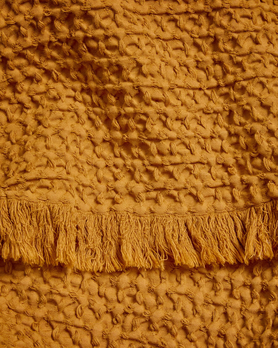 Manta Nulina 100% algodón waffle mostaza 130 x 170 cm