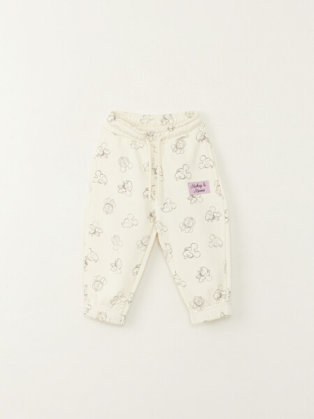 Pantalón deportivo jogger estampa mickey y minnie Crudo