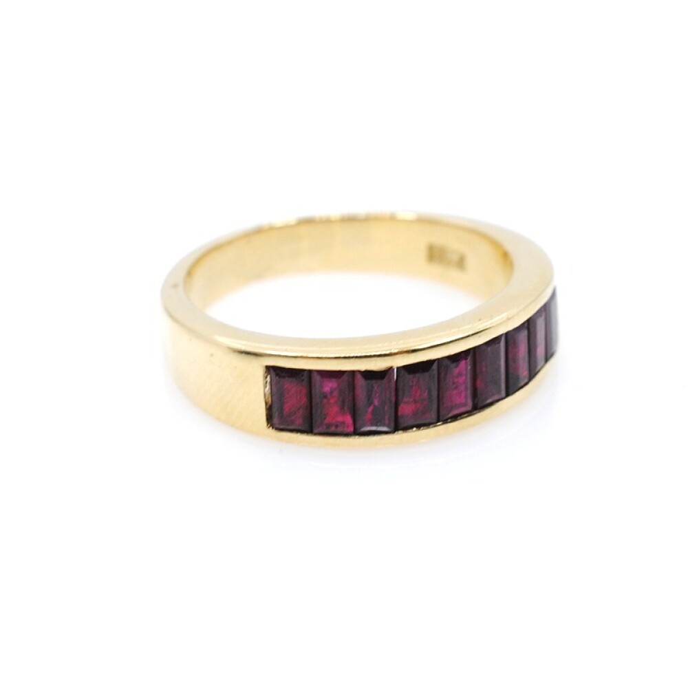 Anillo en oro 18k amarillo y 9 rubies corte baguette Anillo en oro 18k amarillo y 9 rubies corte baguette