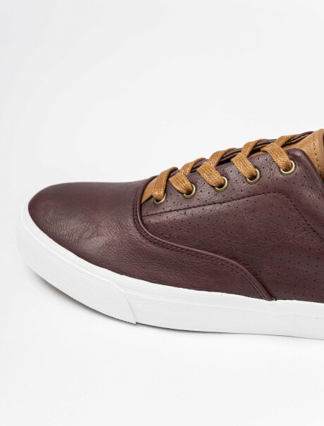 Champion perforado tostado