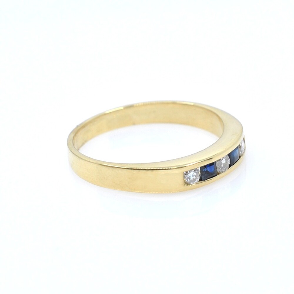 Anillo en oro 18k amarillo, brillantes y zafiros Anillo en oro 18k amarillo, brillantes y zafiros