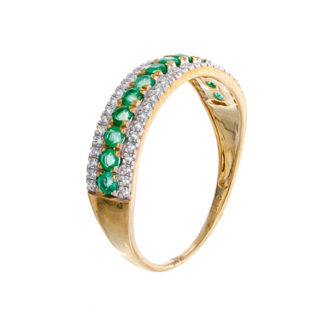 Anillo de oro 9 ktes con esmeralda y circonias. Anillo de oro 9 ktes con esmeralda y circonias.