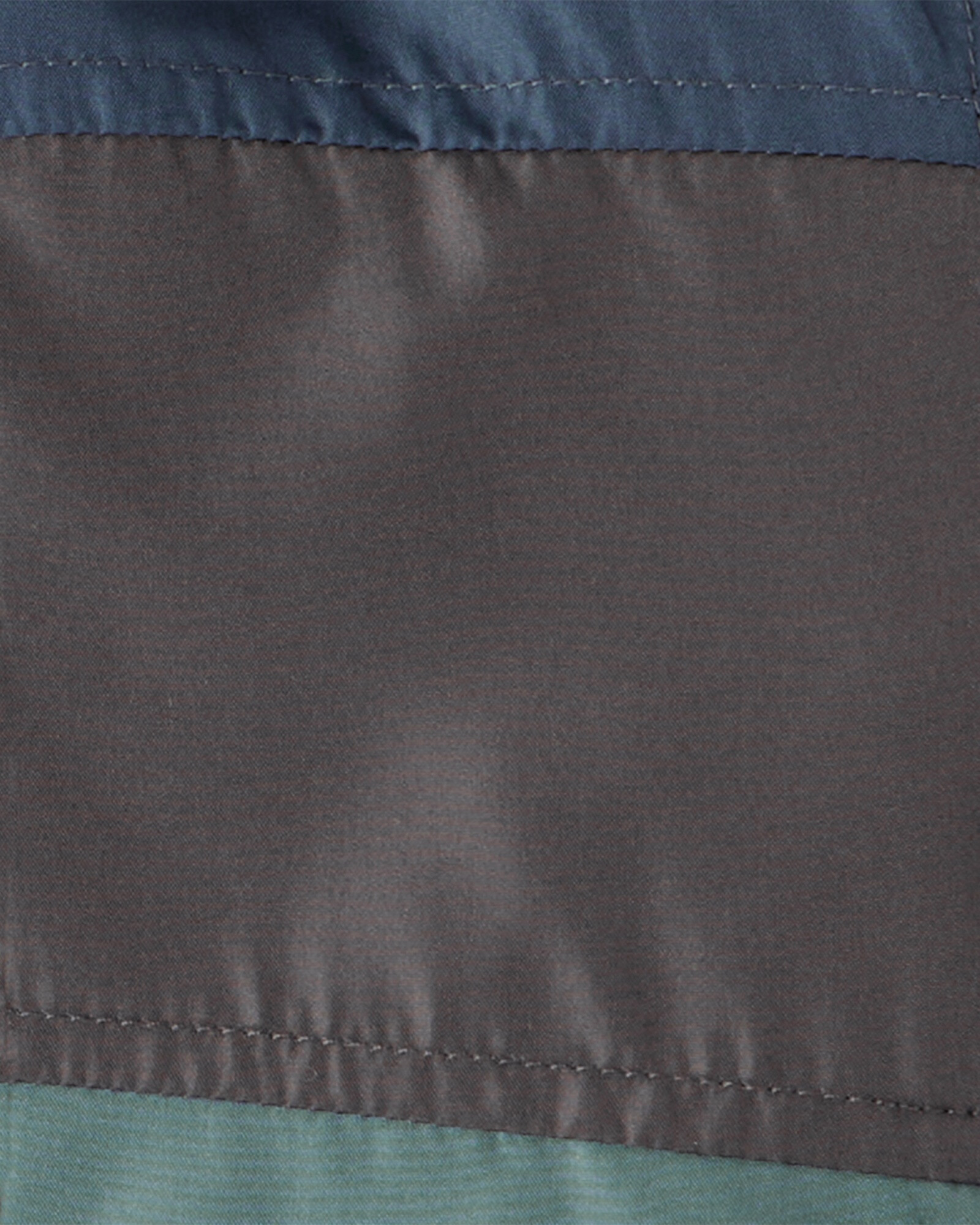 Campera resistente al agua, diseño bloques de color azul, negro y verde. Talles 12-24M Sin color