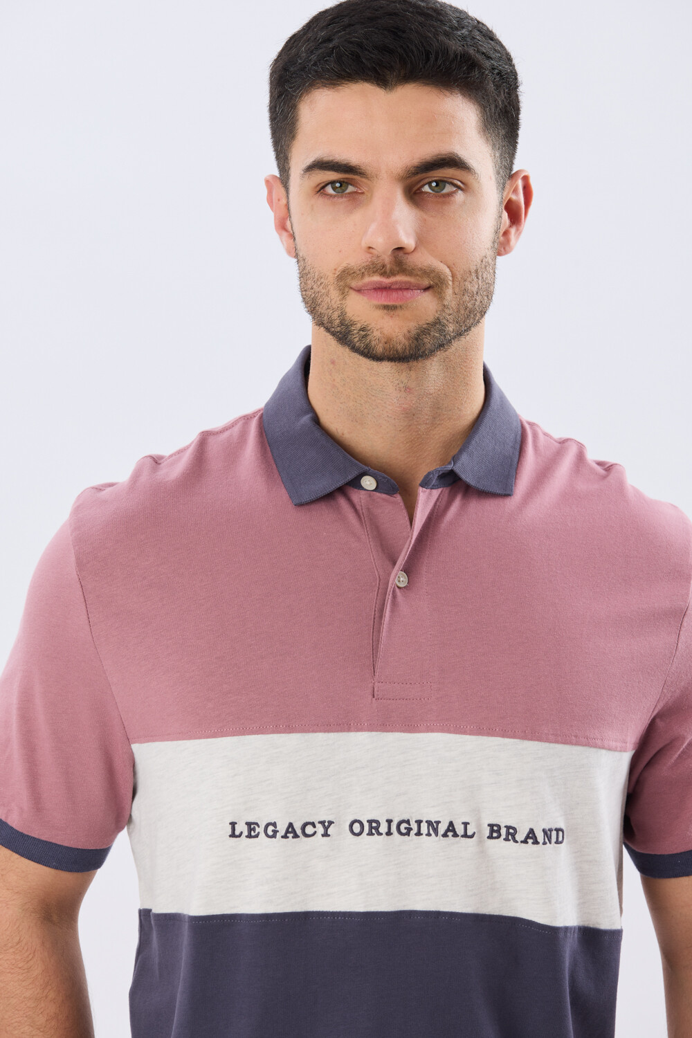 REMERA POLO RAYADA JERSEY Rosa