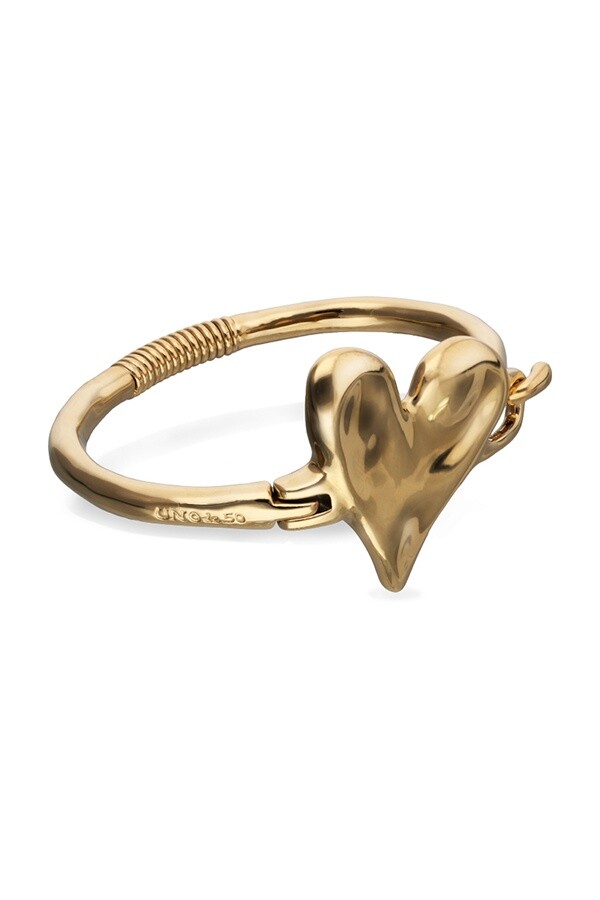 PULSERA SEMIRIGIDA DE ALEACIÓN DE METALES BAÑADA EN ORO 18K CON DETALLE DE CORAZÓN Pulsera