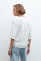 Blusa con botones crudo