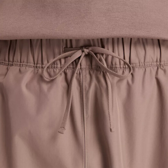 Pantalón New Balance Woven Marrón