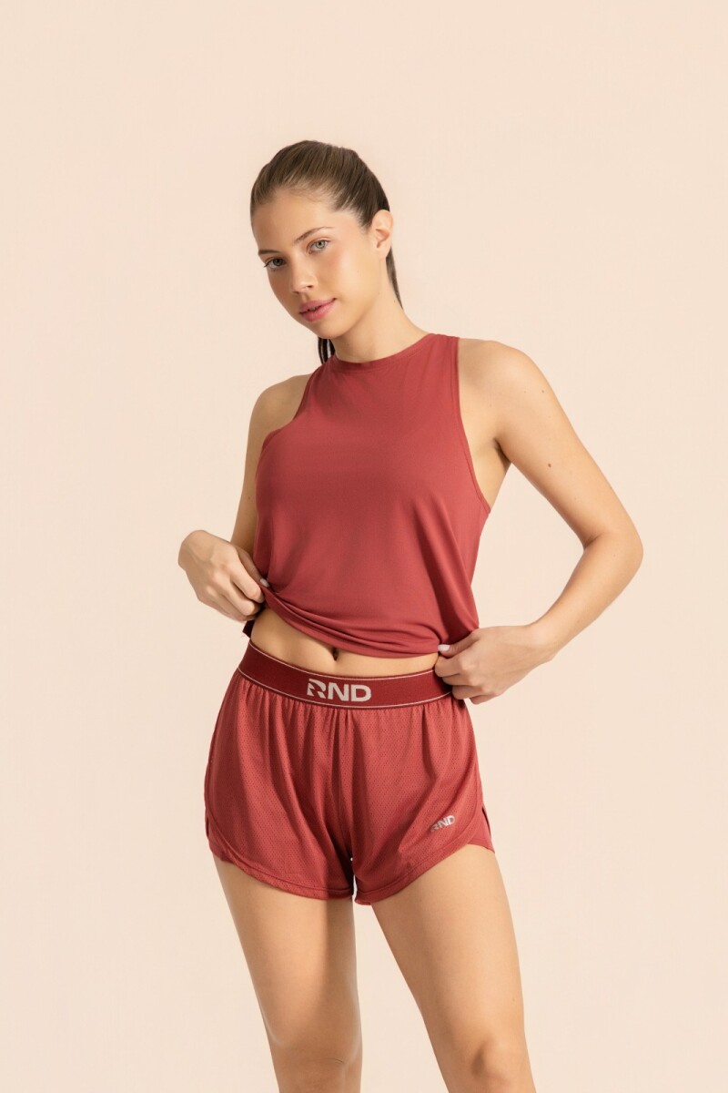 Musculosa Deportiva, Terracota