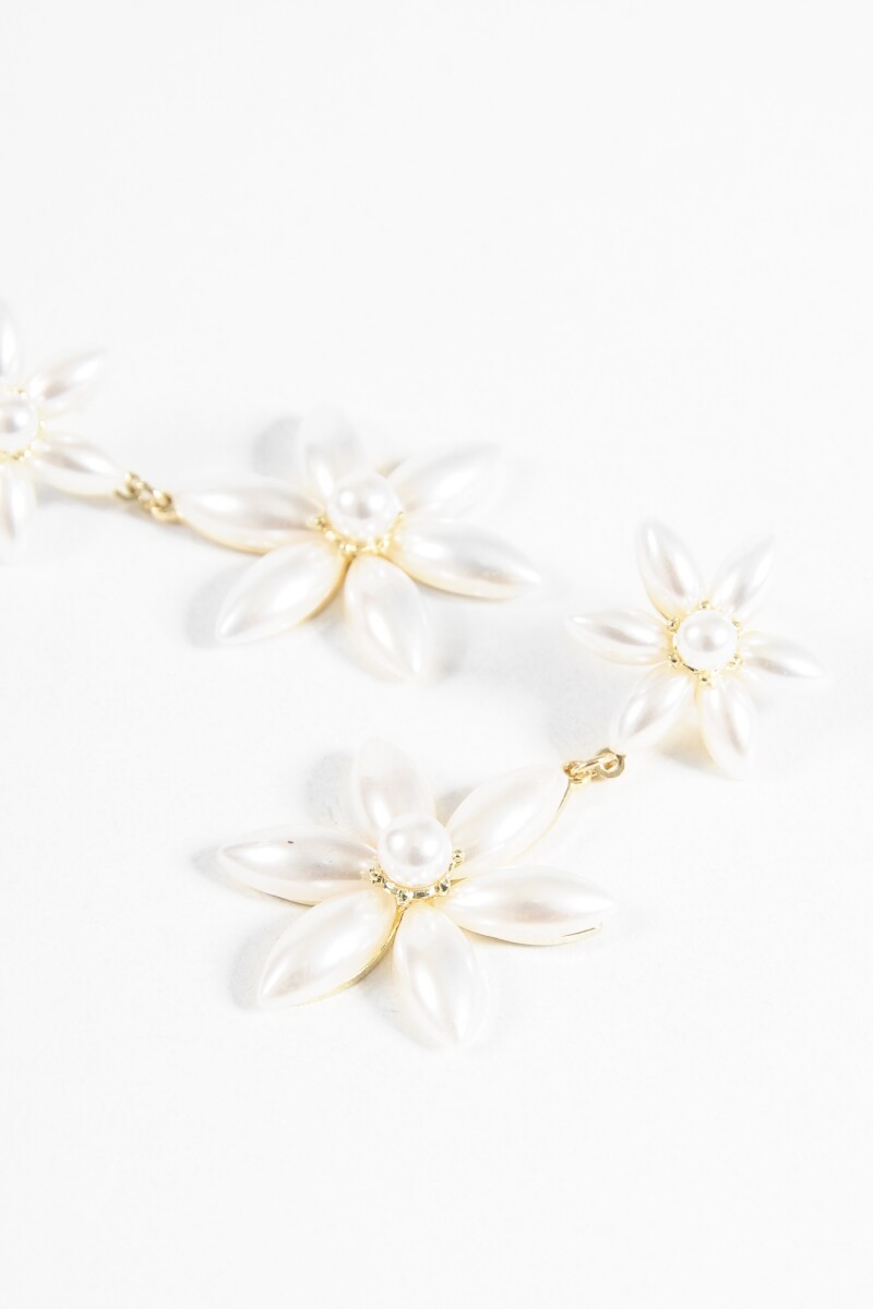 Caravanas acero flor perla dorado