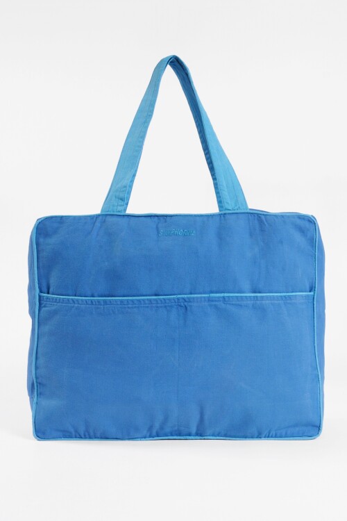 Bolso con vivos en contrastes azul