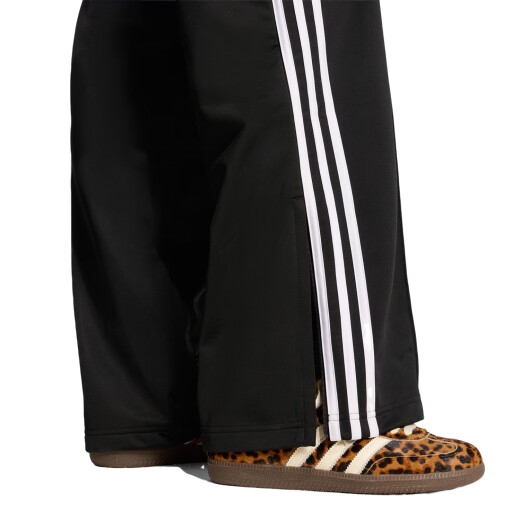 Pantalón Adidas Firebird Loose - Negro Pantalón Adidas Firebird Loose - Negro