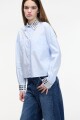 Camisa tachas Celeste