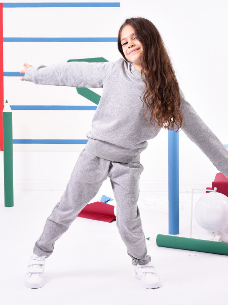 BUZO DEPORTIVO A LA BASE GRIS MELANGE M