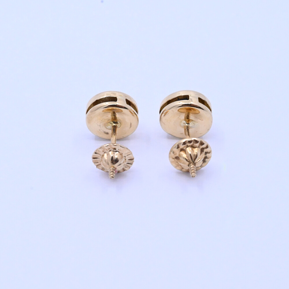 Caravanas oro 18k y zafiros engarce inglés. Caravanas oro 18k y zafiros engarce inglés.