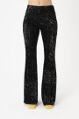 PANTALON FLARE DE LENTEJUELAS. Negro