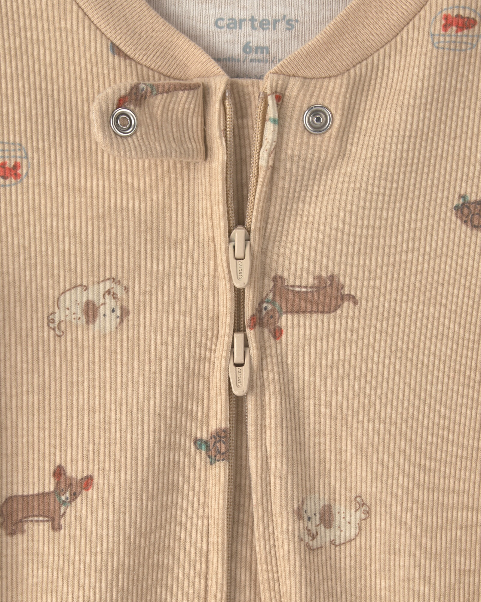 Pijama una pieza de algodón, con pie, marrón, diseño perros Pijama una pieza de algodón, con pie, marrón, diseño perros