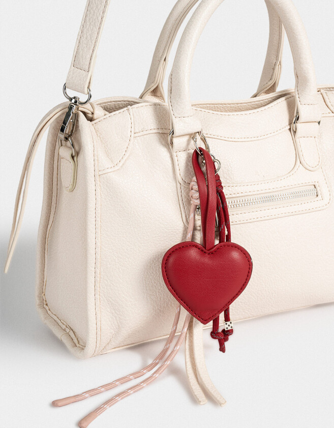 City Cartera City Con Charm - Blanco Crudo