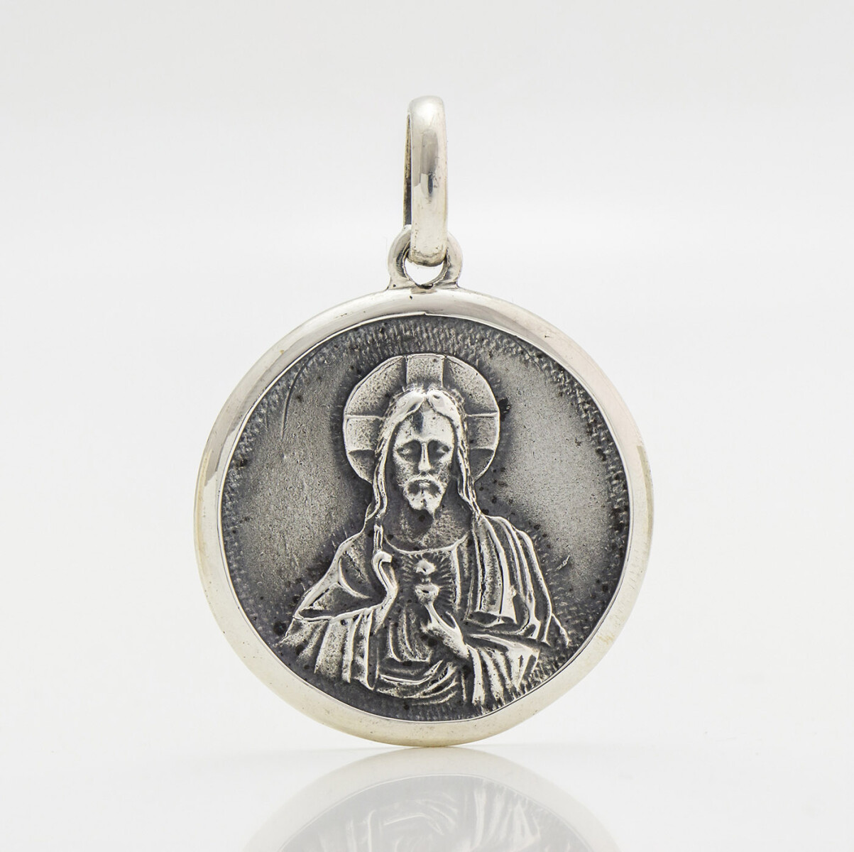 Medalla religiosa sagrado corazón con borde de plata 900, 3cm. 