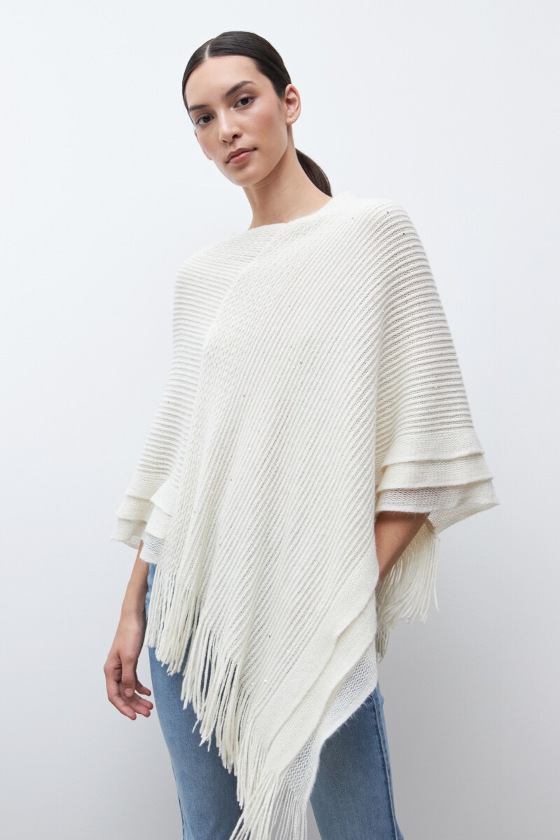 Capa tejida con flecos crudo