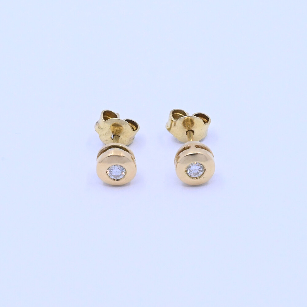 Caravanas oro 18k y brillantes Caravanas oro 18k y brillantes