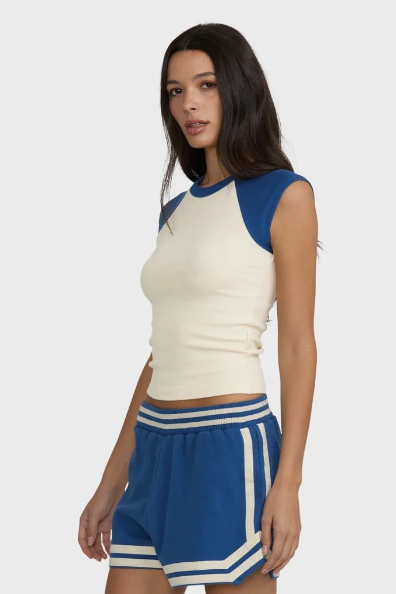 REMERA SURF CAMP SS RAGLAN N-amarillo