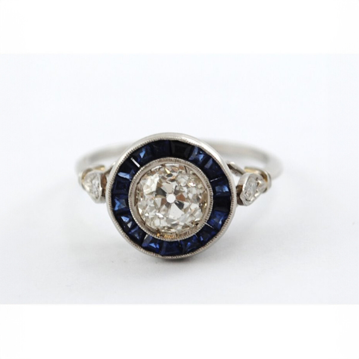 Anillo platino, brillantes y zafiros sintéticos 