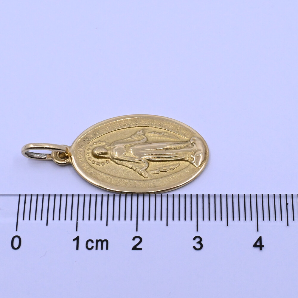 Medalla oro 18k virgen milagrosa 2,4 cm x 1,5 cm. Medalla oro 18k virgen milagrosa 2,4 cm x 1,5 cm.