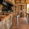 Taburete Tolix en metal con respaldo Gris