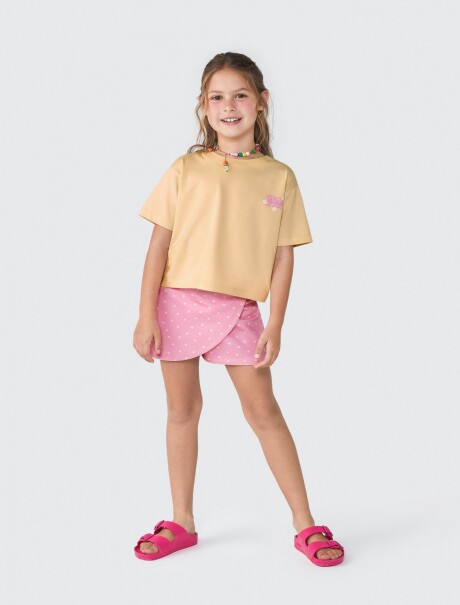CONJUNTO INFANTIL CON FALDA SHORT NARANJA