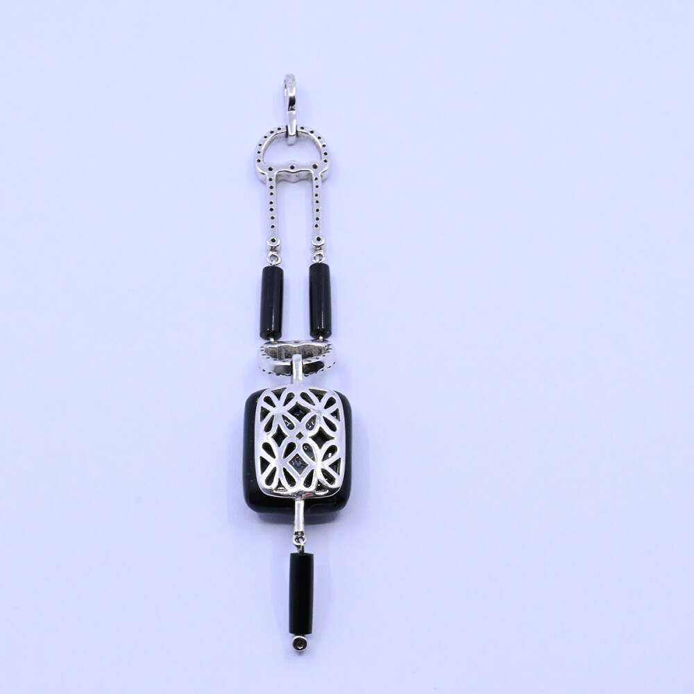 Colgante oro 18k blanco con brillantes y onix. Colgante oro 18k blanco con brillantes y onix.