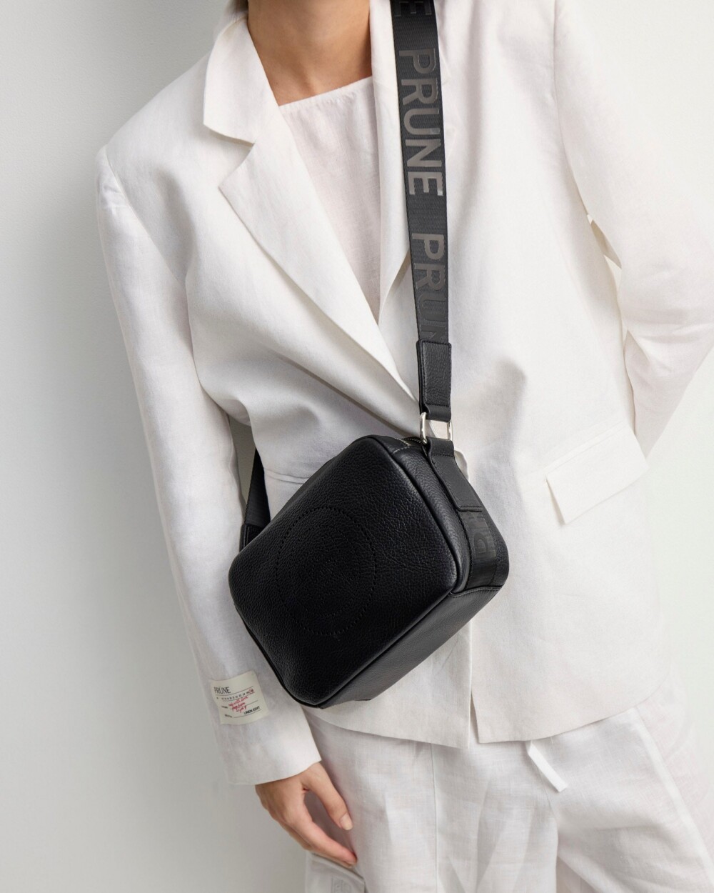 Bandolera Key en efecto cuero graneado Negro