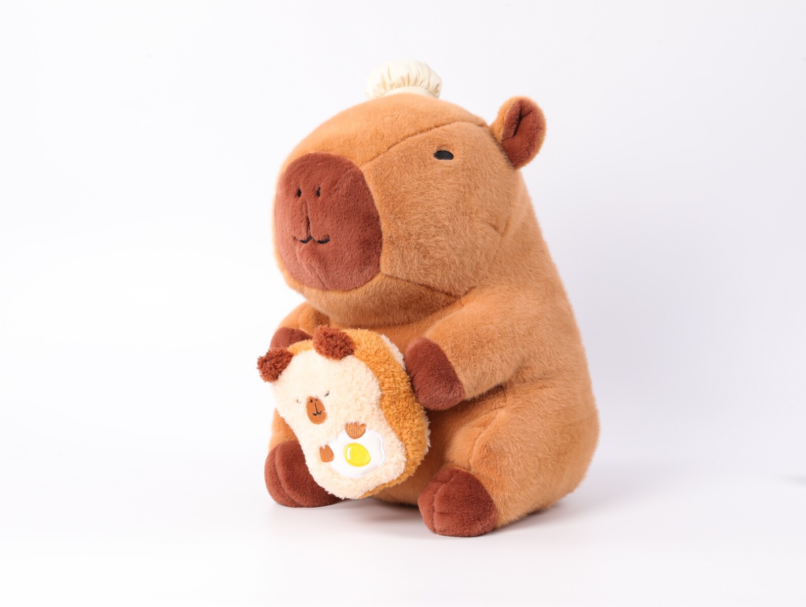 PELUCHE 35 CM (CAPIBARA MARRÓN CON TOSTADA) 