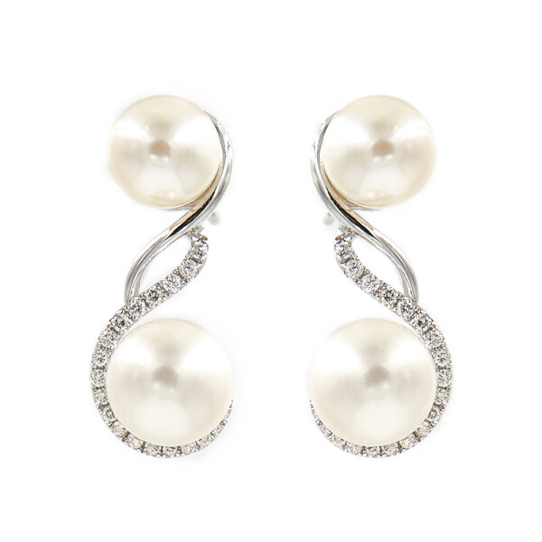 Caravanas Sinfónica en oro blanco 18K con perlas y brillante Caravanas Sinfónica en oro blanco 18K con perlas y brillante