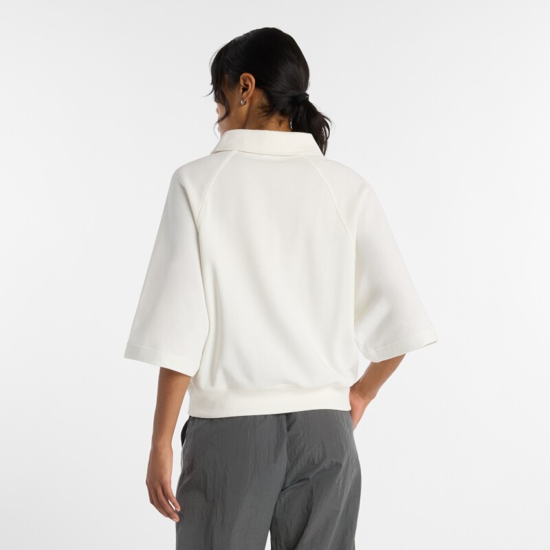 Remera New Balance de Dama - Coastal - WT611044SST CRUDO