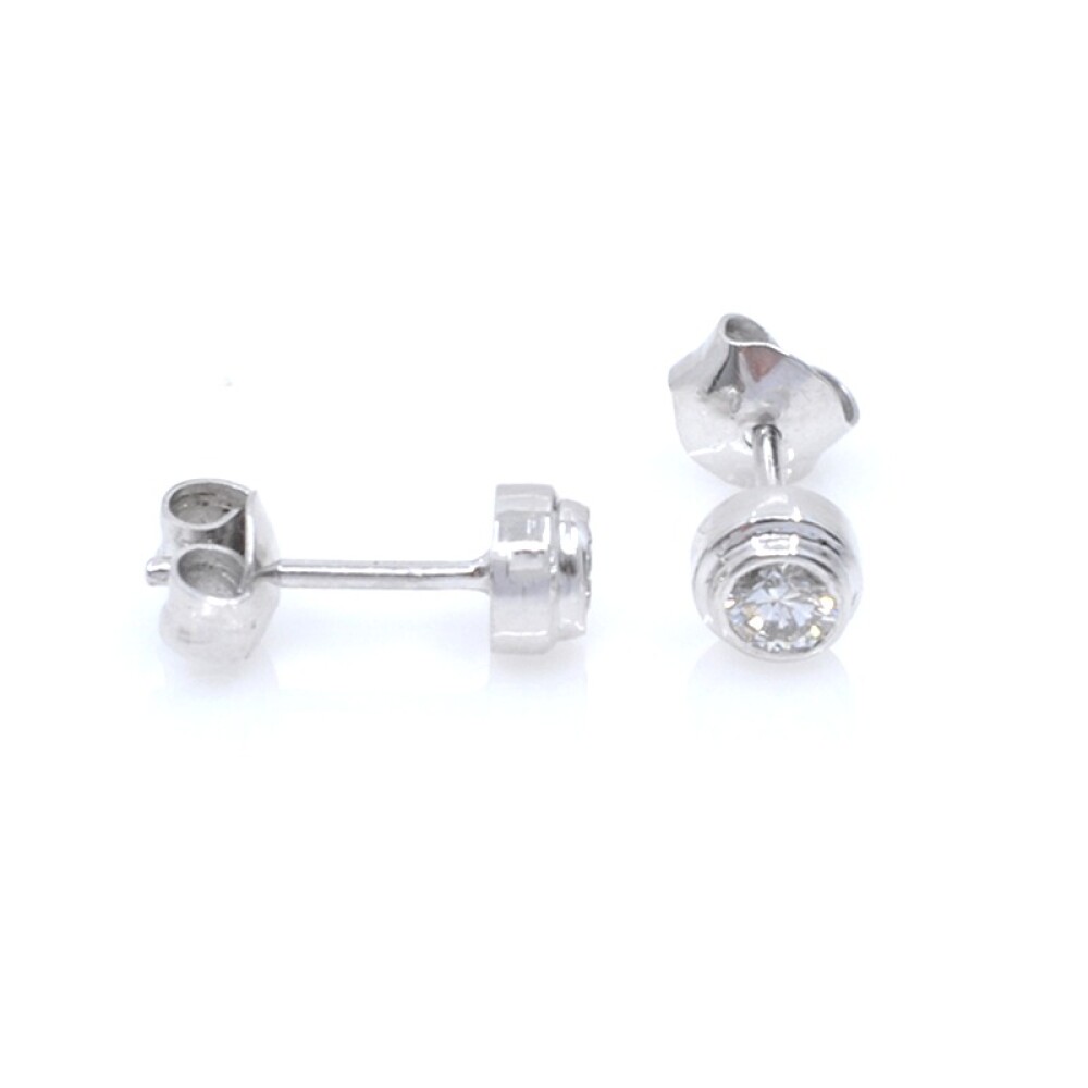 Caravanas en oro blanco 18k y brillantes Caravanas en oro blanco 18k y brillantes