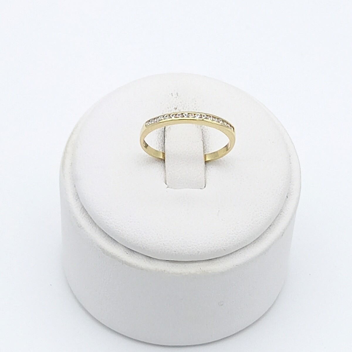Anillo de oro 10 ktes con circonias, MEDIO SIN FIN. 