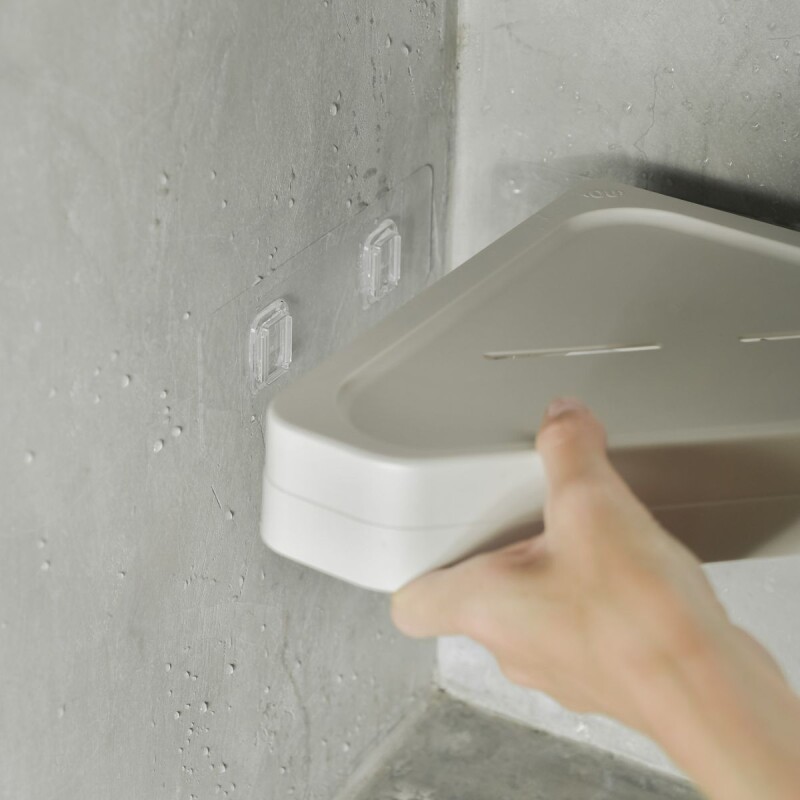 Estante organizador esquinero de baño con adhesivo Negro