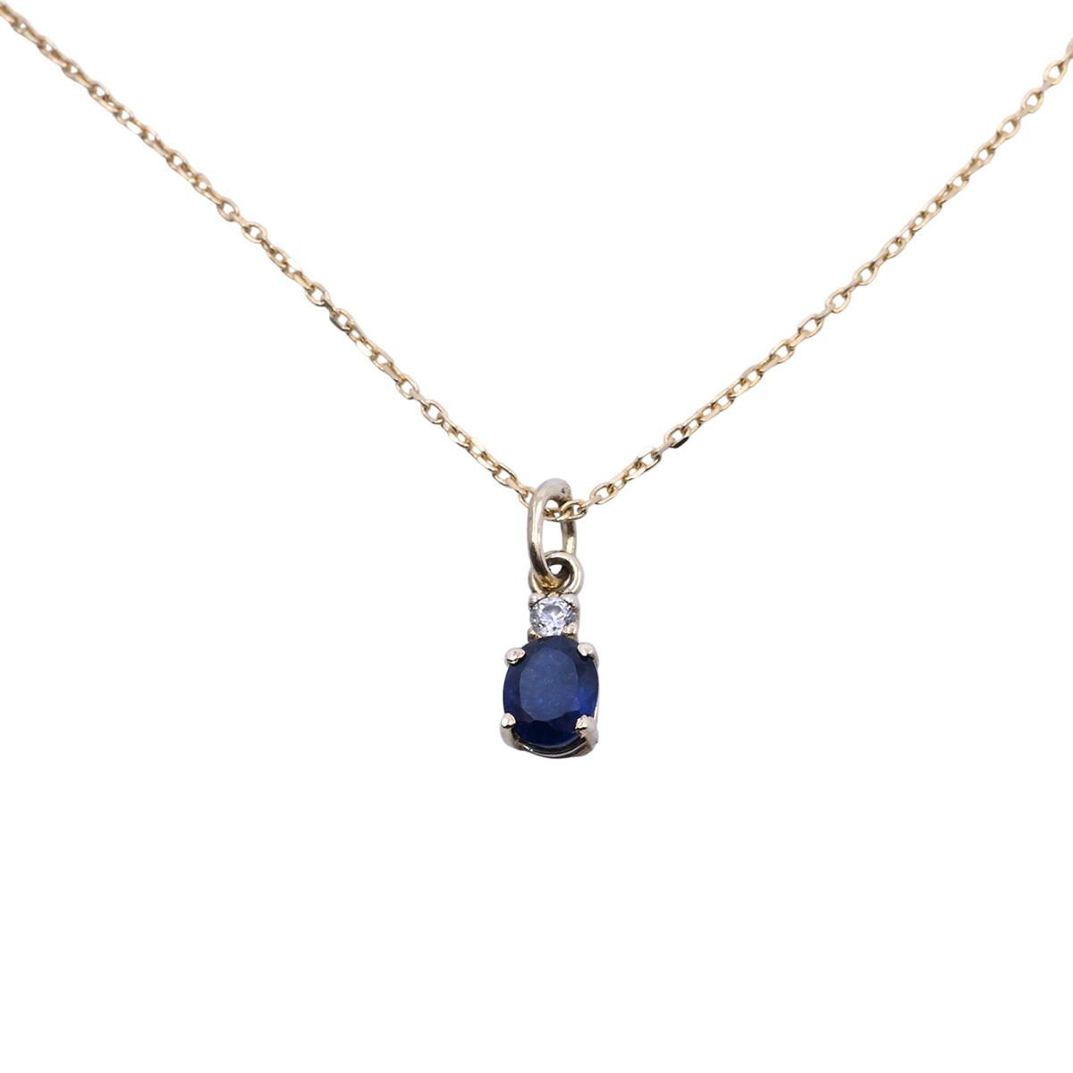 Colgante oro 18k con zafiro oval y zirconia. 
