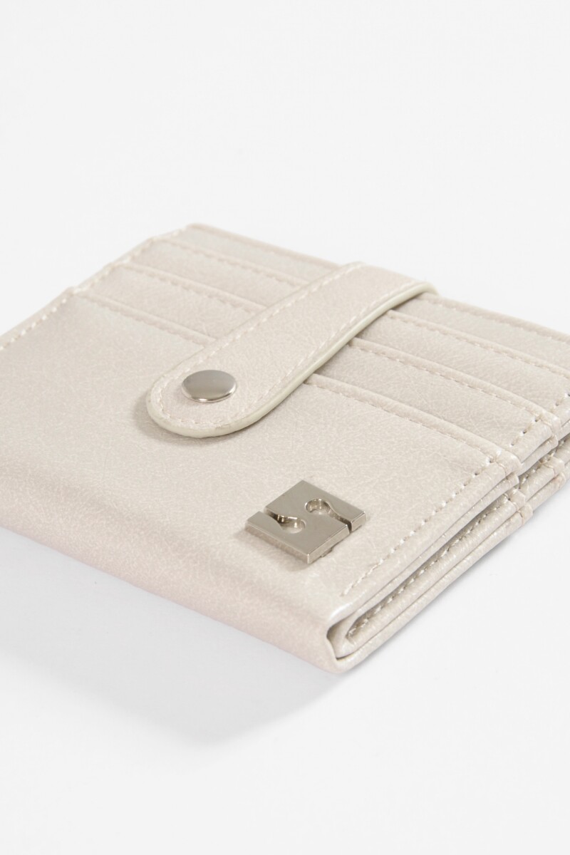 Tarjetero flap shinny crudo